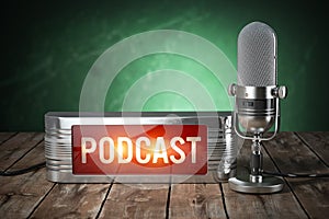 Podcast. Vintage microphone and signboard with text podcast photo