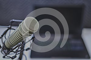 Podcasting setup with microphone in focus