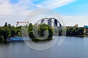 Podilsko-Voskresenskyi Bridge or Podilskyi Metro Bridge is a combined road-rail bridge over the Dnieper River under construction