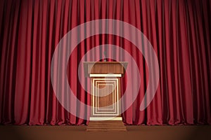 Podium and microphone in center of theatrical stage