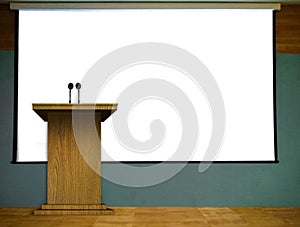 Podium on Stage with Blank Projector Screen