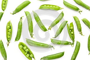 Pods with fresh green peas on white background