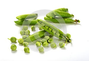 Pods of green peas isolated on a white background. Green ripe fr