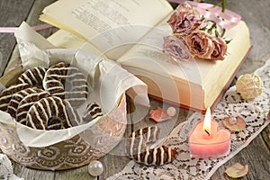 Poem book with burning candle