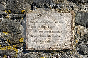 Poem by Eugene Montale engraved in stone along the roadside near Monterosso al Mare, Italy photo