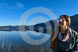 Poertschach - Woman smiling and having a good time at Woerthersee in Carinthia