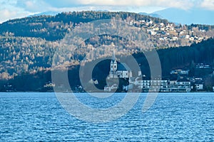 Poetschach - A little village at the Woerthersee with mountains in the back in Carinthia