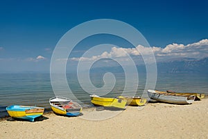 Pogradec, Albania. Colorful boats by the lake