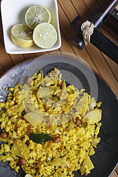 Poha - A breakfast snack made of beaten rice photo