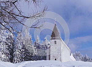 Pohorje Slovenia Areh abandoned church in winter photo