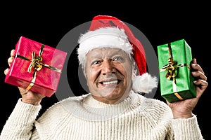 Poignant Aged Man Showing Red And Green Xmas Gifts