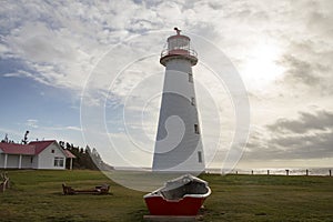 Point Prim Lighthouse, PEI and old wooden rowboat