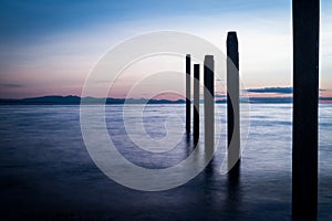 Point Roberts pilings and silky water at night time