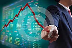 Point to falling graph of stock market