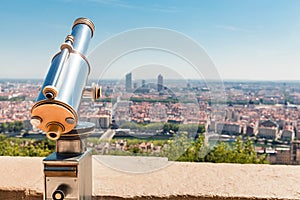 point with tourist telescope in Lyon city in France