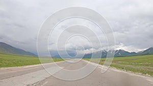 Point of View driving through Pamir Highway in Kyrgyzstan