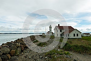 The Point Wilson Lighthouse and the Keeper`s House in Fort Worden State Park, Port Townsend, Washington, USA