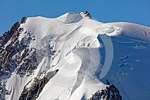 Pointe Lachenal, Chamonix, south-east France, Auvergne-RhÃÂ´ne-Alpes. Artistic snowdrifts created by power of wind at Pointe Lachen