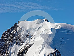 Pointe Lachenal, Chamonix, south-east France, Auvergne-RhÃ´ne-Alpes. Artistic snowdrifts created by power of wind at Pointe Lachen