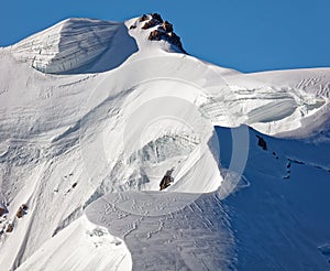 Pointe Lachenal, Chamonix, south-east France, Auvergne-RhÃ´ne-Alpes. Artistic snowdrifts created by power of wind at Pointe Lachen