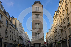 Pointe Trigano, narrow building between Beauregard street and de ClÃ©ry street in Paris photo