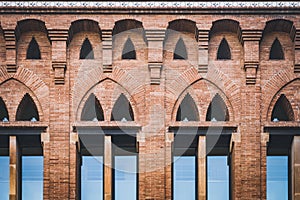 Pointed arch windows of a pavilion of la Maternitat built in Modernista style photo