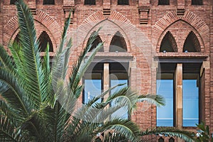 Pointed arch windows of a pavilion of la Maternitat built in Modernista style photo