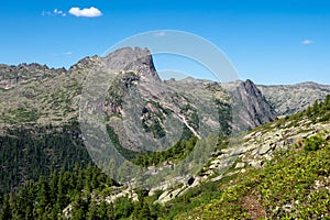 Pointed cliff, a misty mountainside. Ghost rocks