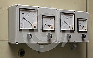 Pointer ammeters and voltmeters on the control cabinet