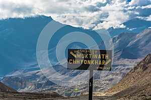 A pointer to a fork in the road in Muktinath and Chinchar, Nepal