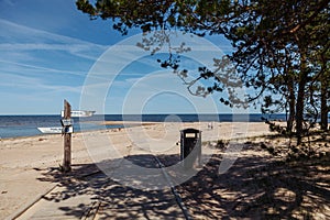 Pointers on the pillar on the beach. Cape Kolka. Latvia.