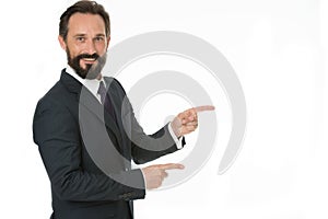 Pointing at copy space. Man pointing index fingers isolated on white. Man bearded mature in formal wear. Businessman or