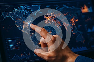 A pointing finger interacts with a digital world map displaying global data and analytics