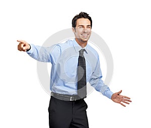 Pointing, marketing and advertising with a business man in studio on a white background with mockup. Space, product