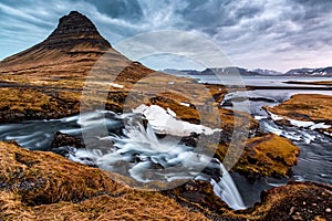 Pointy Mount Kirkjufell guards over the waterfall Kirkjufellsfoss .psd