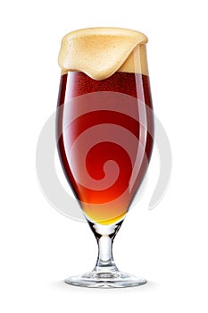 Pokal glass of fresh dark brown beer with cap of foam isolated on white background