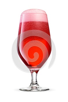 Pokal glass of fresh red beer with cap of foam isolated on white. Fruit beer cocktail