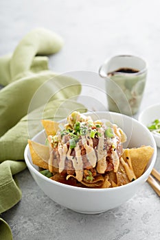 Poke bowl with fried wonton wrappers