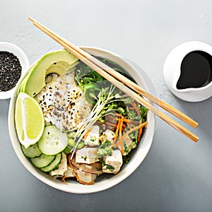 Poke bowl with silken tofu, rice and vegetables