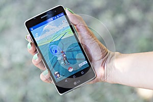 Pokemon Go game in a hand