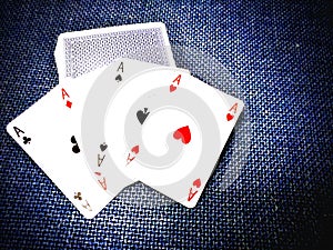 poker of aces  on deck of playing cards