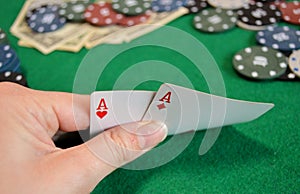 Poker background - chips, cards and money on green table