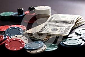 poker cards, chips, dice and dollars.