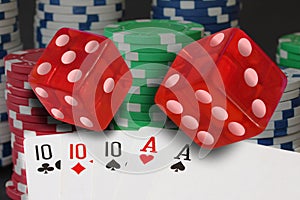 Poker cards showing full house and chips, jetons and red dices