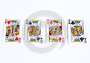 Poker cards on white backgrounds.Four kings
