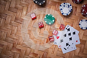 Poker Chips in casino gamble green table.