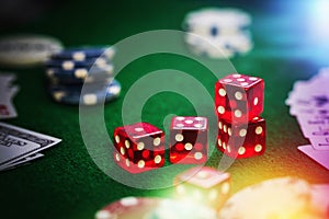 Poker Chips in casino gamble green table.