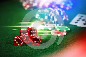 Poker Chips in casino gamble green table with colorful multi col photo