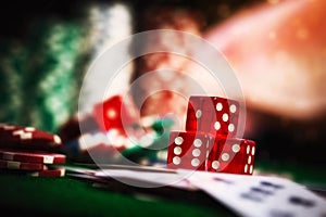 Poker Chips in casino gamble green table, dark vintage picture s