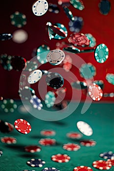 poker chips fall on the poker table